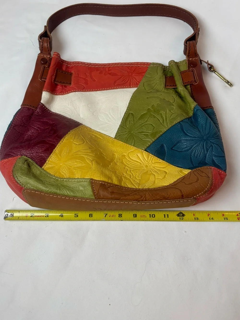 Fossil tooled leather